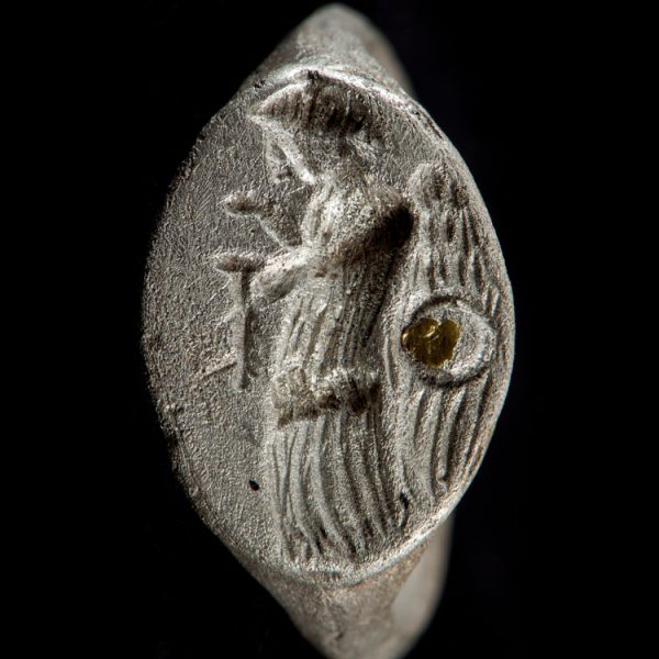 Silver ring’s bezel. A silver ring’s bezel with scene of a Nike. Same. South cemetery. 4th cent. BC