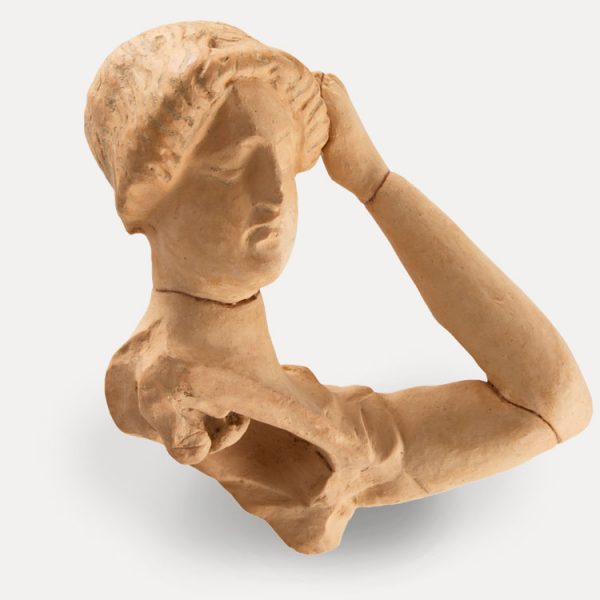 Part of a female figurine – a mourner. Same, South cemetery, Rassias plot. 4th cent. BC.
